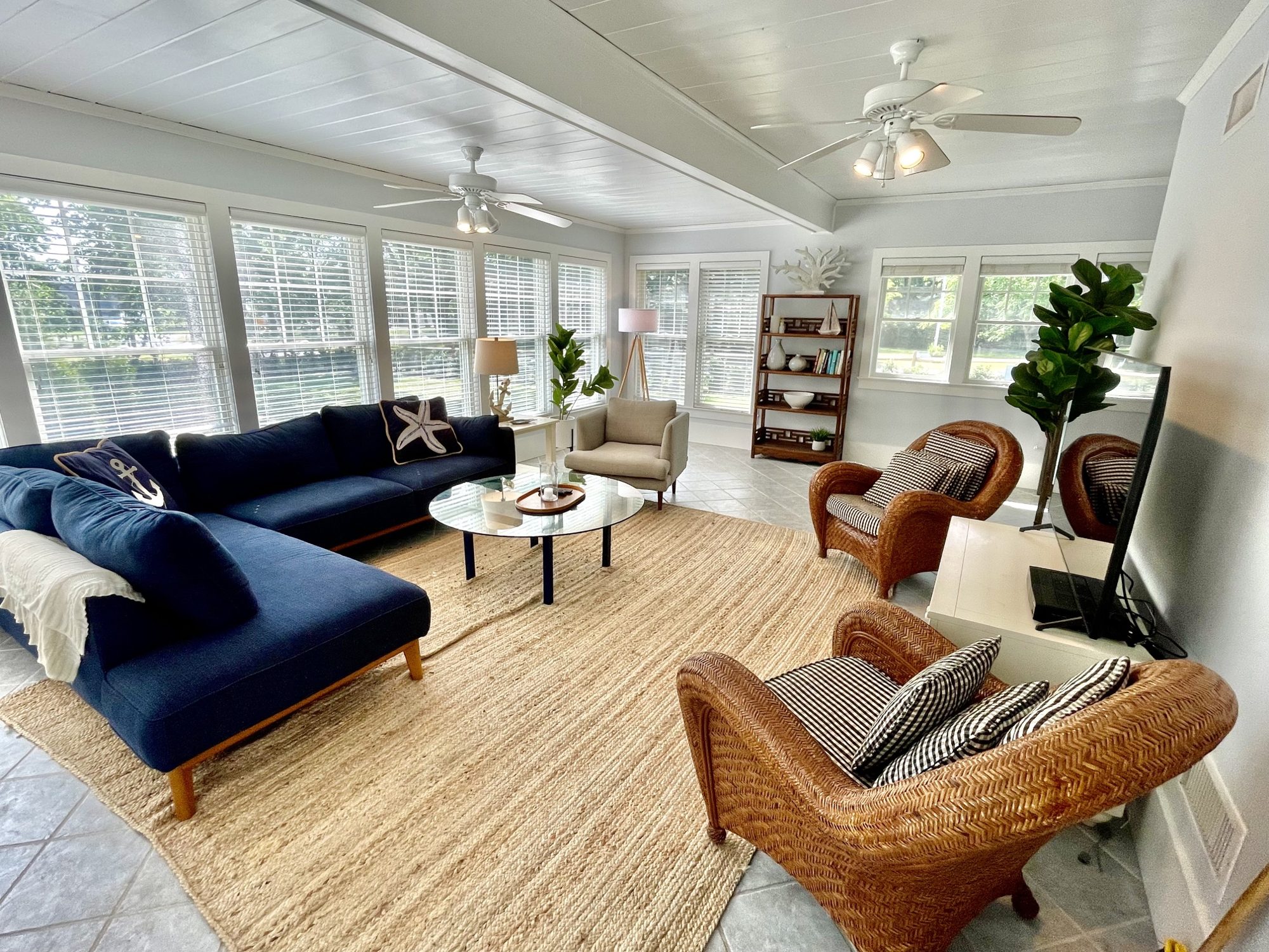 The sunny family room with its wall of windows