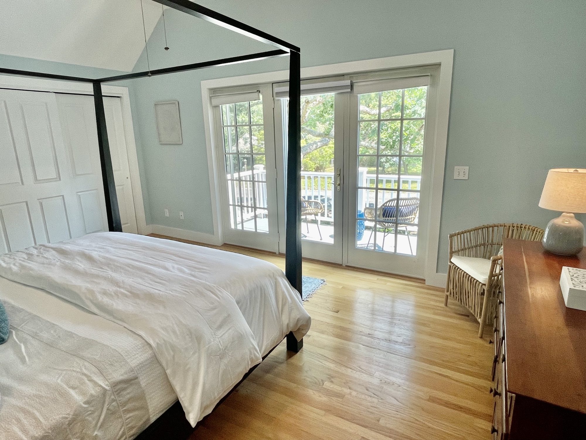 Primary suite: French doors to a private balcony
